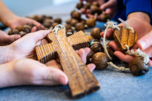 Students holding wooden rosary at St Catherine Laboure Catholic Primary School Gymea